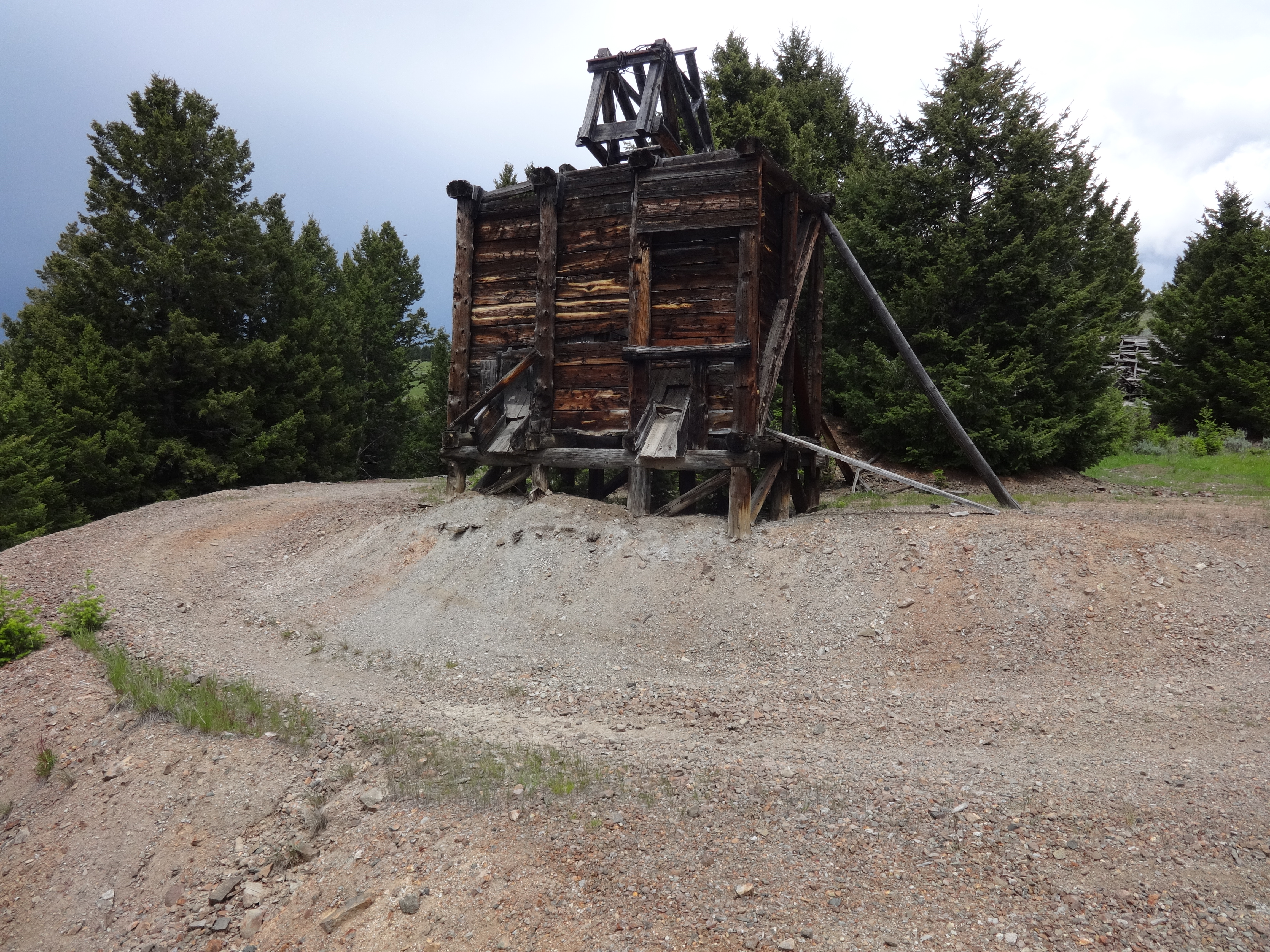 Ore bin and an inclined shaft head frame at the Bonanza Mine, Emery Mining District, Deer Lodge County.