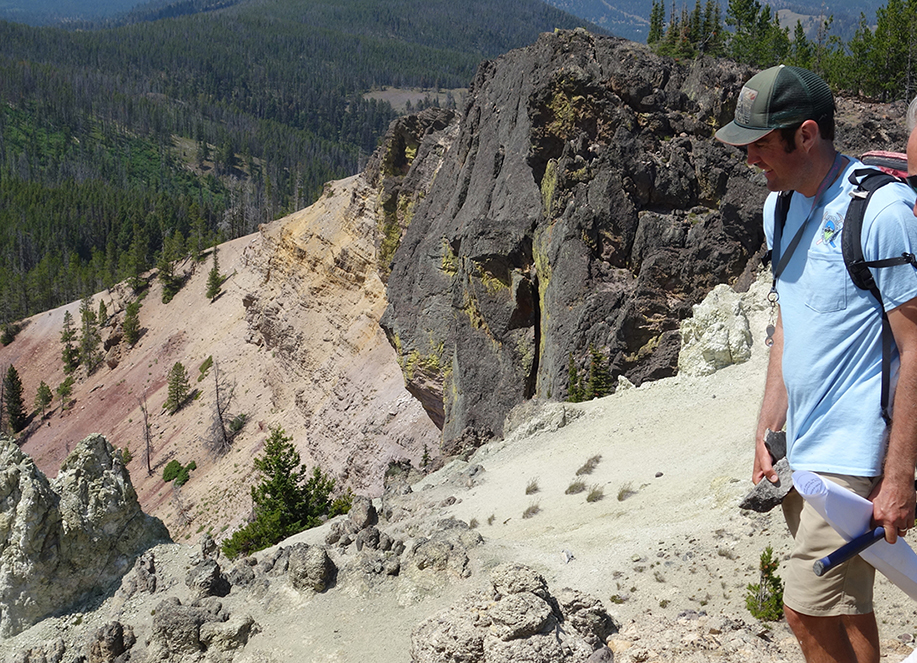 Jesse Mosolf, examining the volcanic rocks at Crater Mountain, southeast of Lincoln, MT