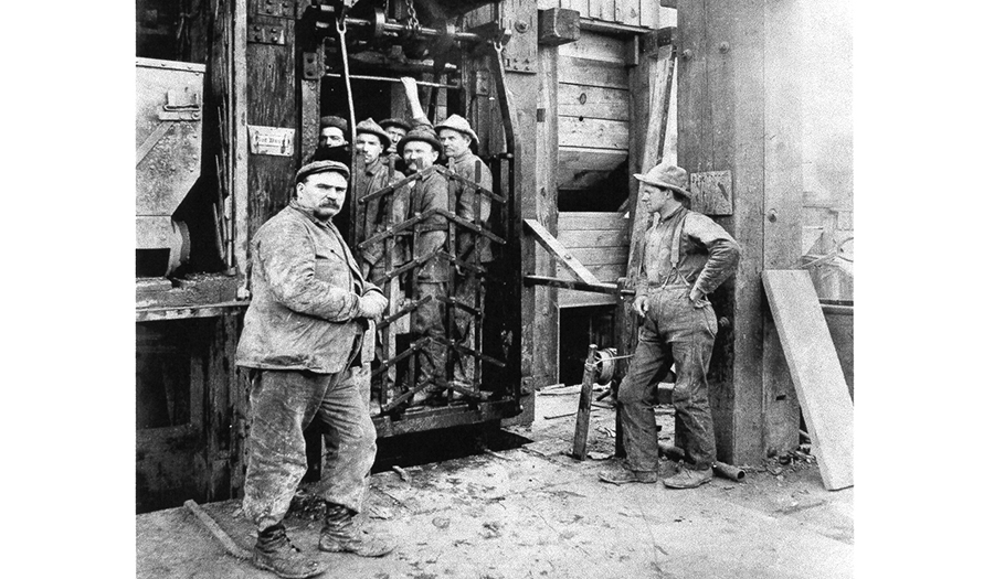 Steward Mine with underground miners in cage ready to go underground