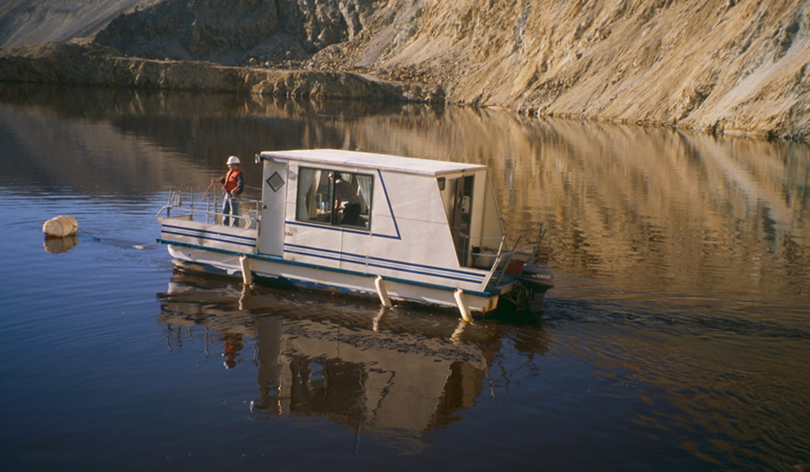 Montana Resources pontoon boat used for Berkeley Pit sampling