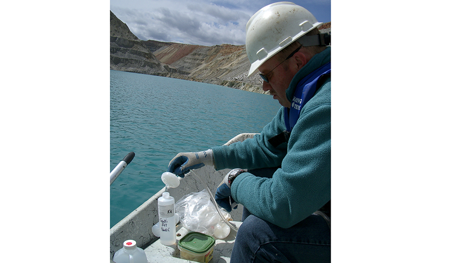 MBMG hydrogeologist James Rose filtering water samples-Continental Pit