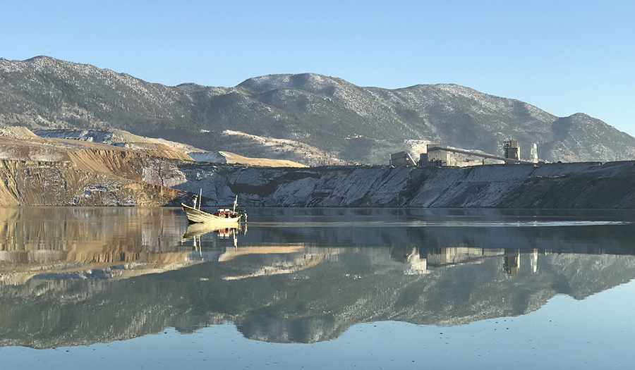 MBMG drone boat sampling Berkeley Pit: note how calm the water surface